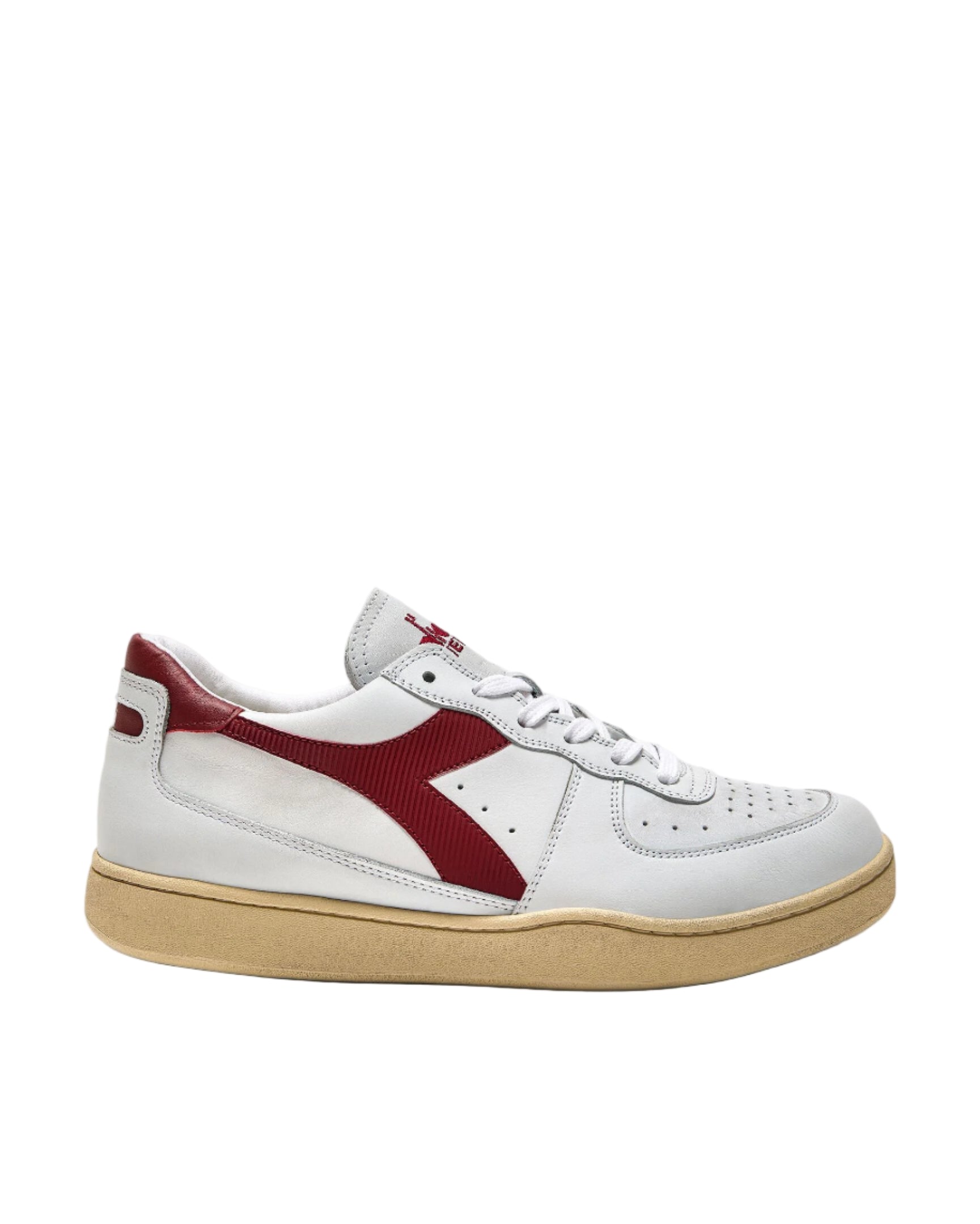 White sneaker with red accents on a white background