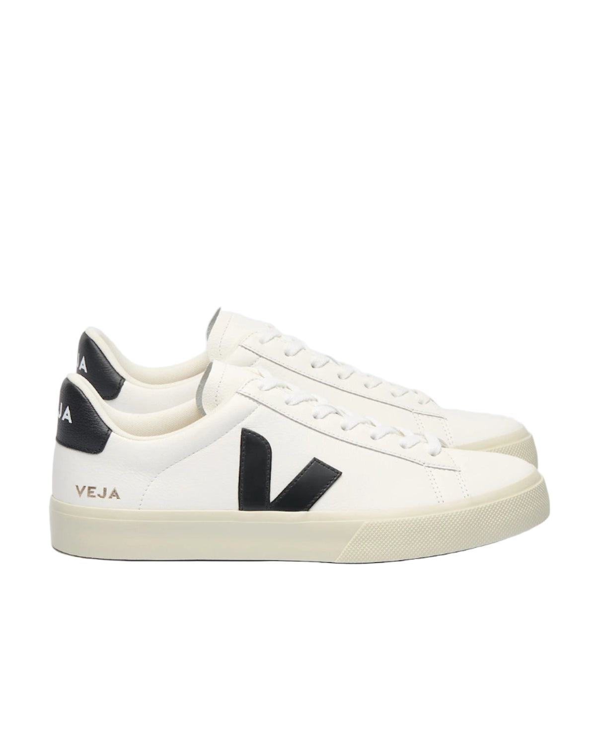 White sneakers with black accents and 'Veja' branding on a white background