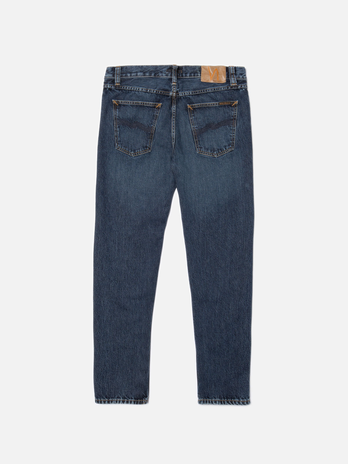 Nudie Jeans Steady Eddie II Blue Soil, men's regular tapered fit jeans in a dark blue wash, shown from the back laid flat.