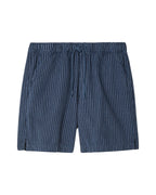 Blue striped shorts on a light gray background