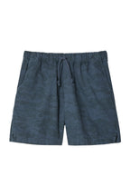 Blue shorts with a drawstring on a light gray background