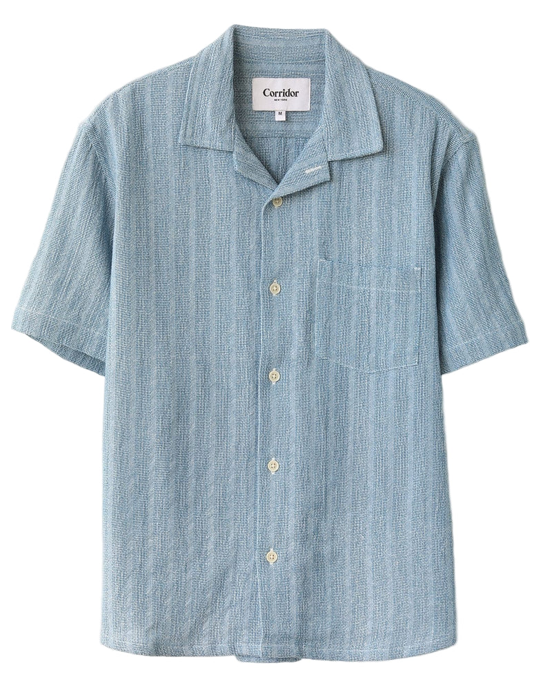 A blue striped short-sleeved camp collar shirt with a single chest pocket.